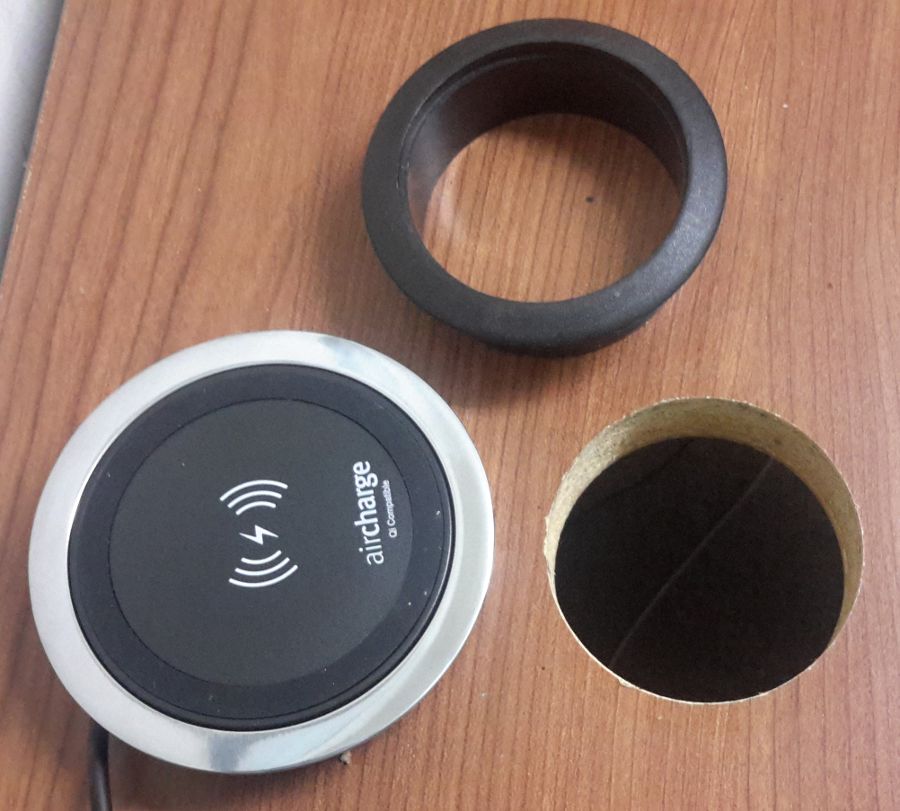 This grommet hole is too small for the Wireless Surface Charger.
