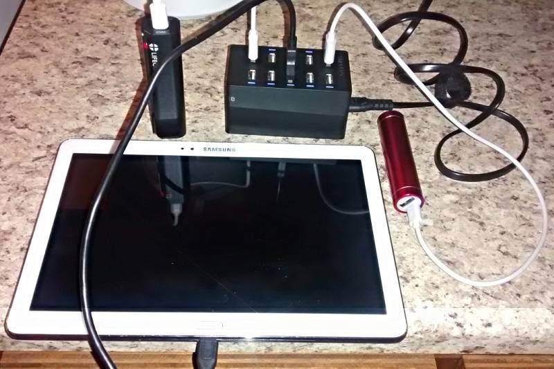 Multiple devices attached to USB charger.
