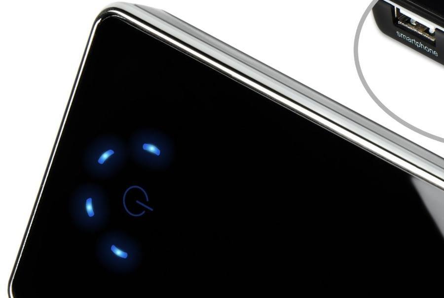 Power button in the center of four LEDs.