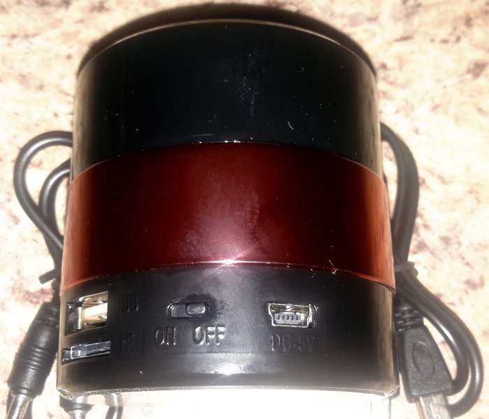 On/off switch on the Nizhi MINI speaker.