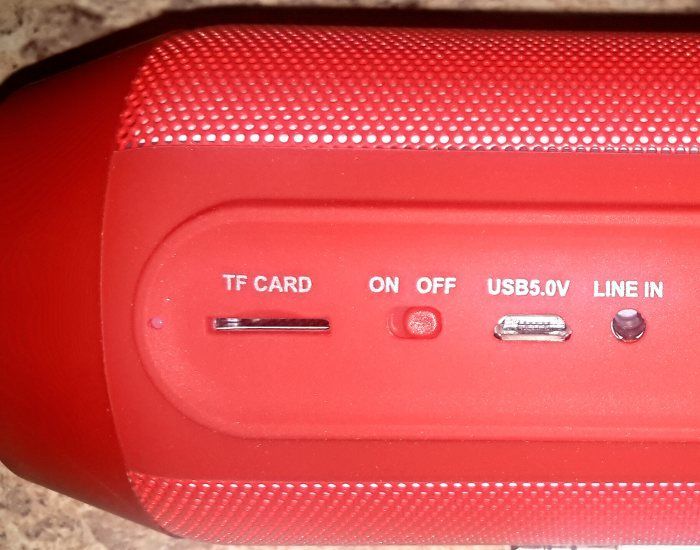 On/off switch, tf card holder, microUSB slot, line in jack. On/off switch, tf card holder, microUSB slot, line in jack.