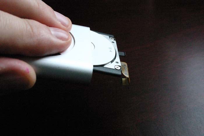 ipod-refurb-slide-clickwheel-out ipod-refurb-slide-clickwheel-out