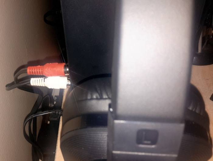 RCA cable connected to back of wireless transmitter. RCA cable connected to back of wireless transmitter.