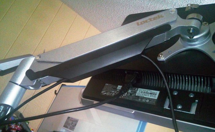 Loctek Dual Arm Desk Mount cable cover.