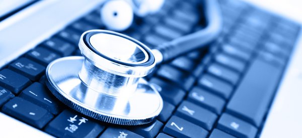 close-up-of-stethoscope-on-laptop-keyboard-2 close-up-of-stethoscope-on-laptop-keyboard-2