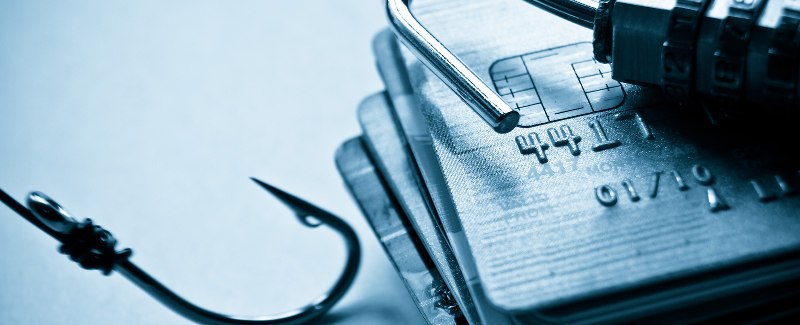security-lock-on-credit-cards-with-a-fish-hook-note-shallow-depth-of-field