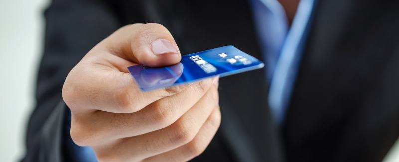 bank-office-worker-providing-credit-card