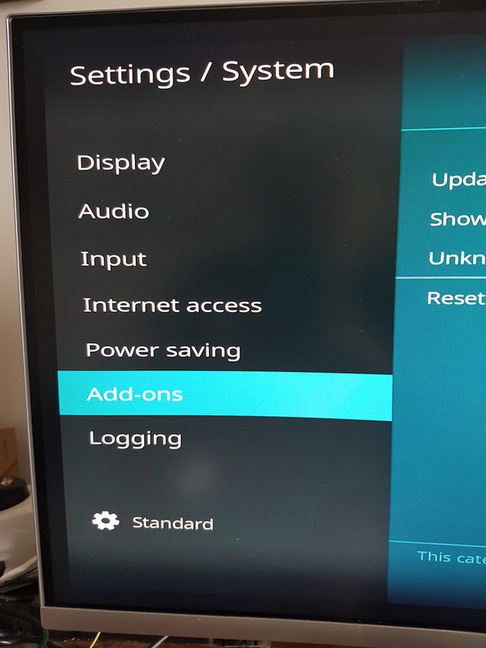 In the Kodi app, navigate to "System > Add-ons."