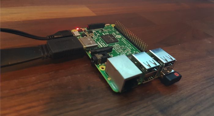 Plug your Raspberry Pi into a power source and it should boot automatically. 