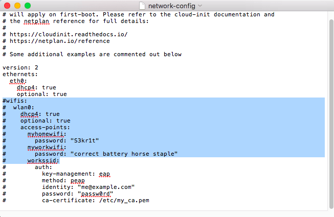 You'll need to uncomment the entire "wifis" section.