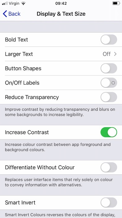 You may find it easier to interact with the Amazon Alexa mobile app, by altering the text size, and the amount of contrast used.