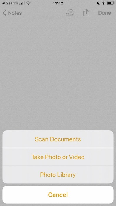 Scanning a document with the Apple Notes application.