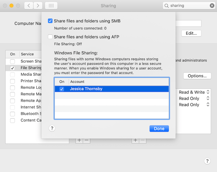In the "Windows File Sharing" section, select every user account that you want to share. 