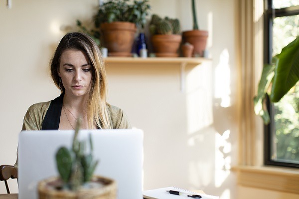 Relaxed Woman Working From Home On Her Laptop