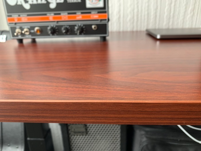 The Sanodesk's mahogany finish.
