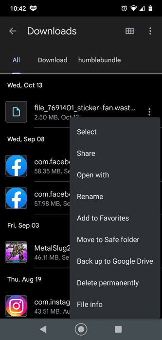 Viewing options on a downloaded file in the Downloads folder.