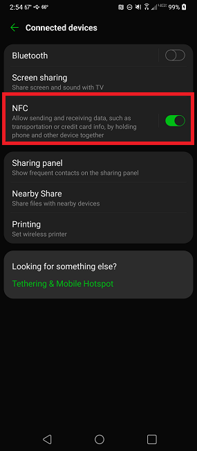Turning on NFC in the device settings.