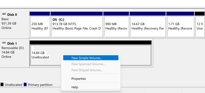 Create a "New simple volume" for the USB drive in Disk Management.