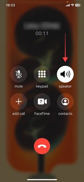 Switching to speakerphone on iOS.