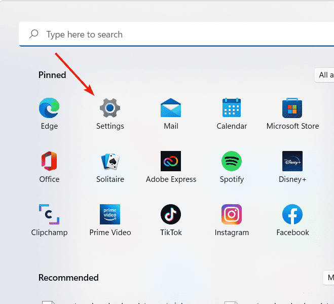 Opening Settings from the pinned section of the Start menu.