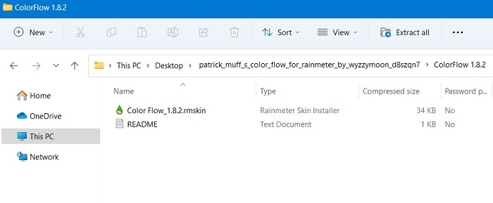 Downloaded Rainmeter RMSKIn file visible in Windows folder. 