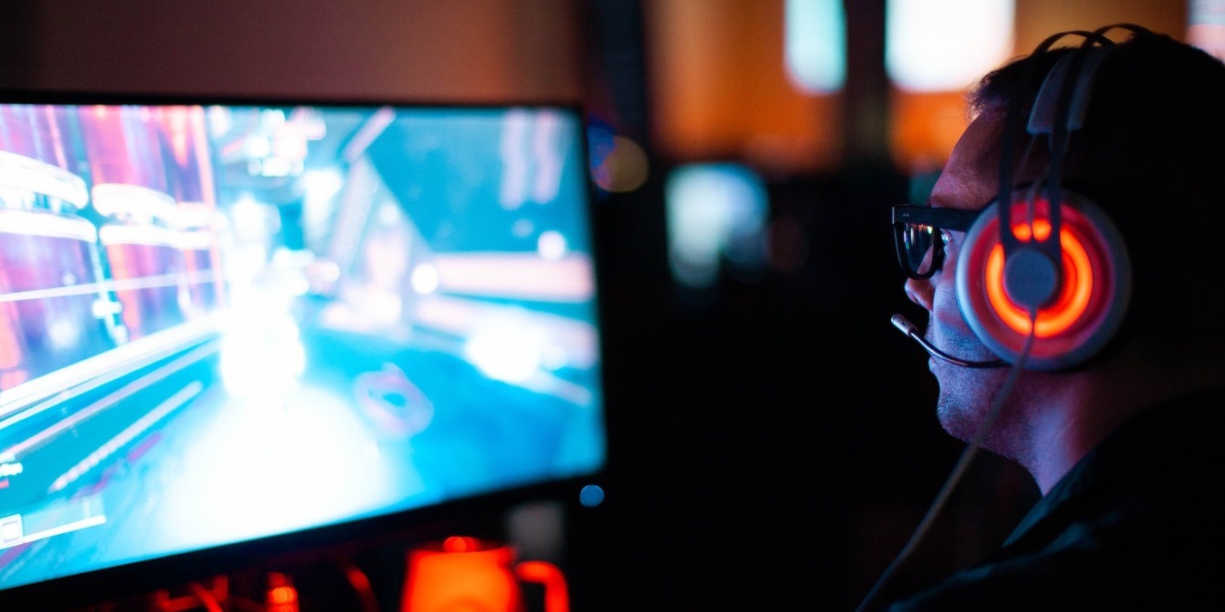 person playing game on computer