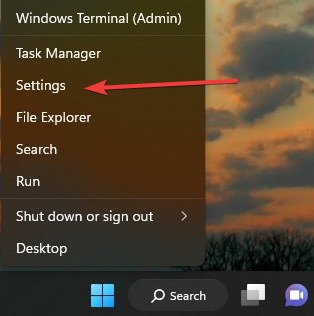 Opening up Settings in Windows by pressing on Start button.
