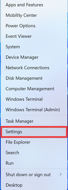 Selecting "Settings' from Quick menu in Windows.
