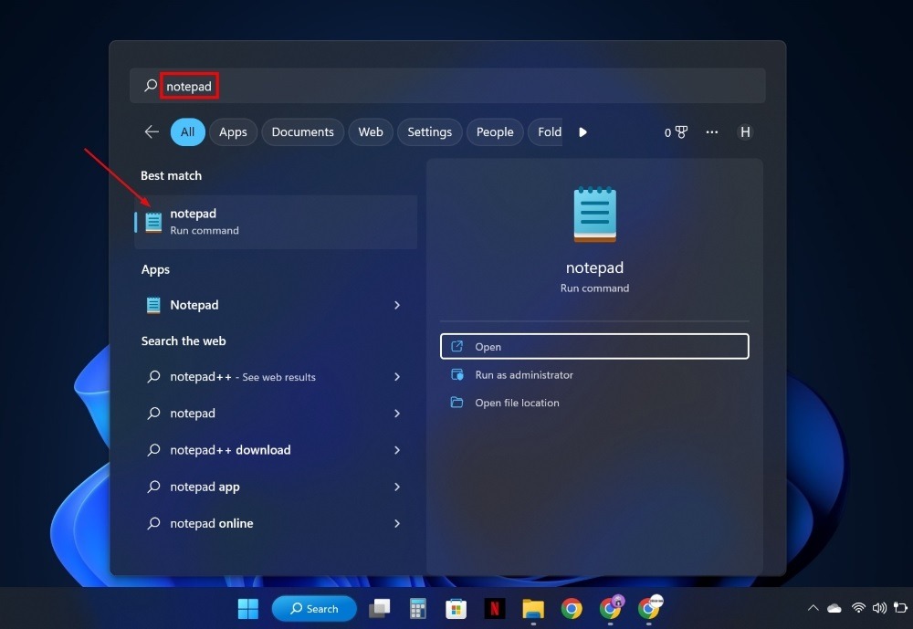 Typing "notepad" in Windows Search. 