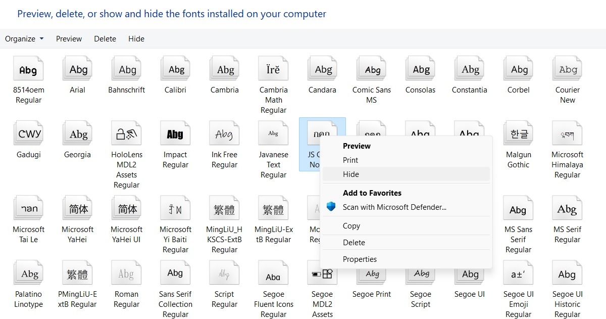 Hide fonts in Control Panel by right-clicking on the font. 