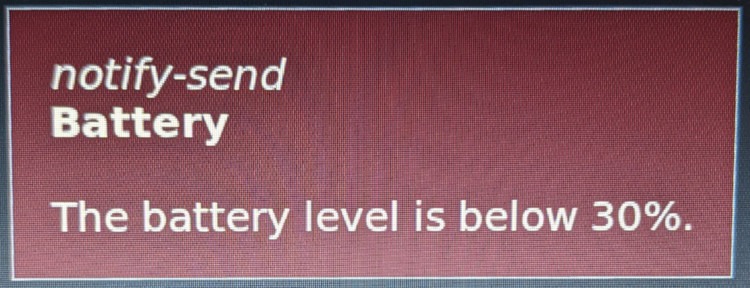 An image of a fnott notification window showing a critical battery message.