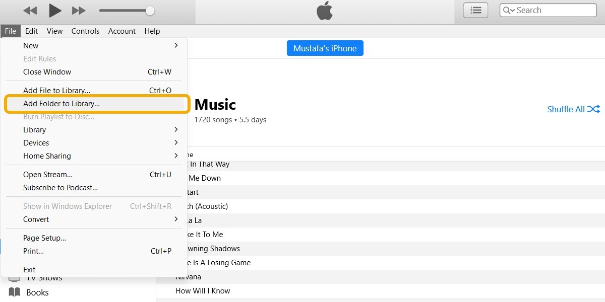 "Add folder to library" option in iTunes for Windows.