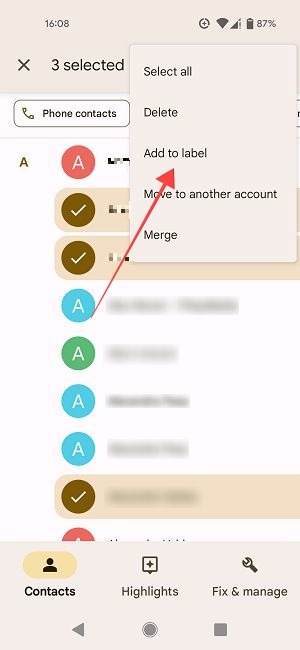 "Add to label" option in Google Contacts app. 