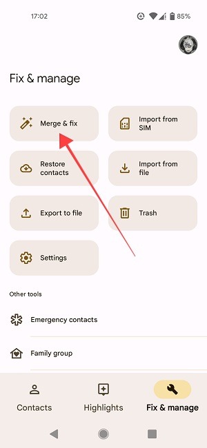 Selecting "Merge & fix" option in Google Contacts app.