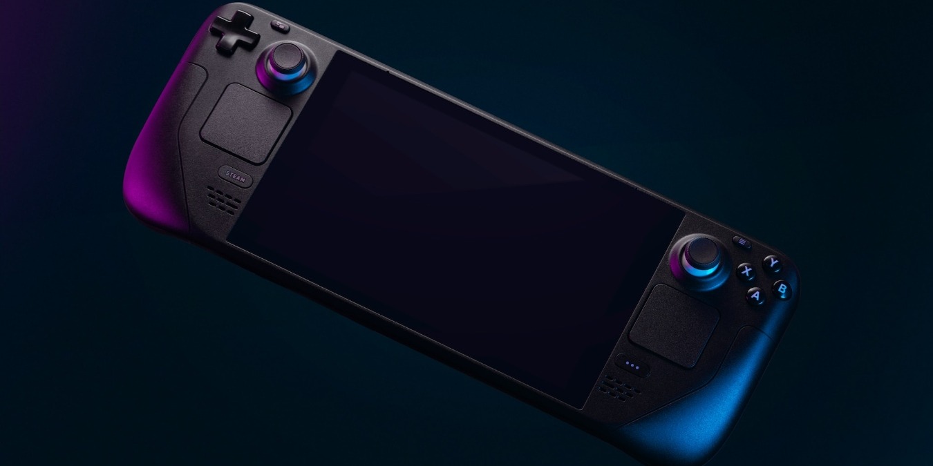 Steam deck pictured on a dark background