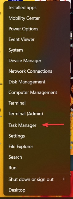 Clicking on "Task Manager" via Start button.