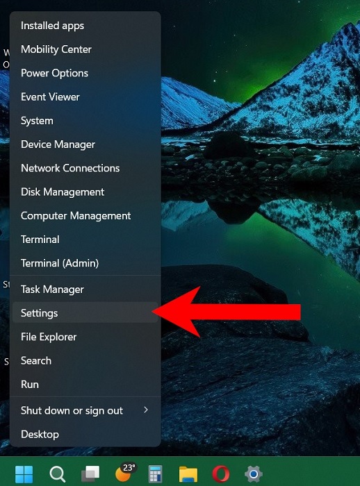 Opening "Settings" from the WinX menu.