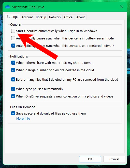 Unchecking the "Start OneDrive automatically when I sign in to Windows" under OneDrive Settings.