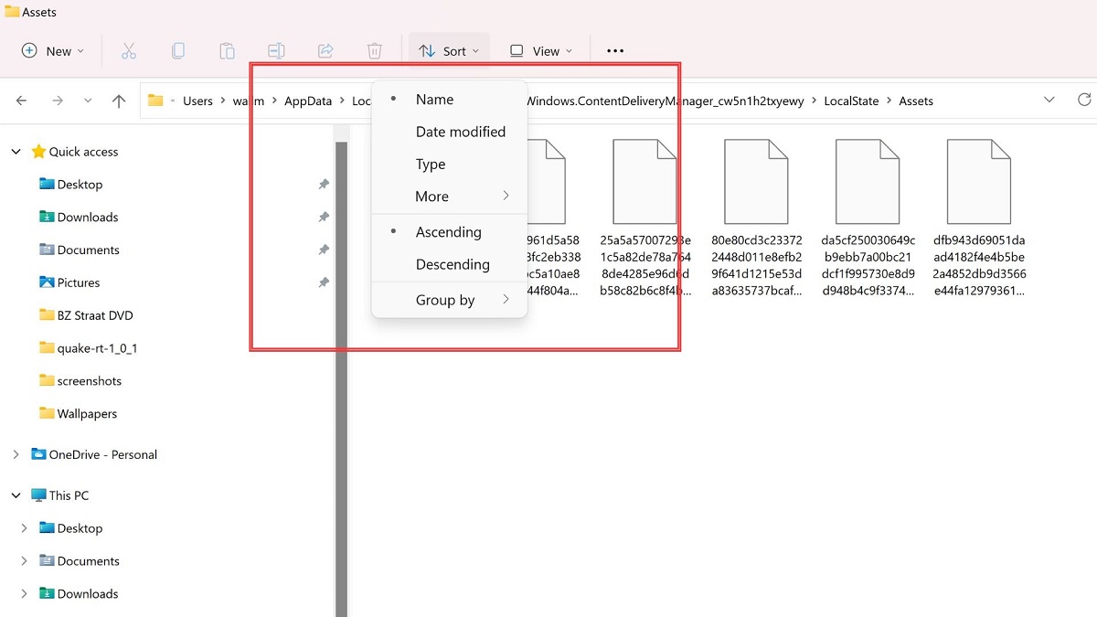Clicking on "Sort" menu in File Explorer ribbon.