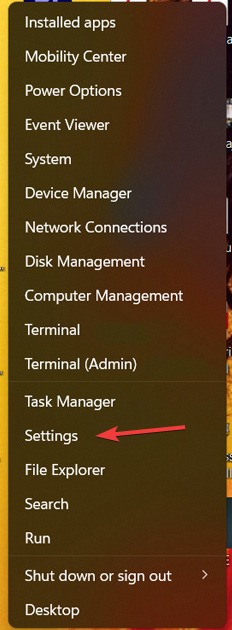 Selecting "Settings" from Start menu.