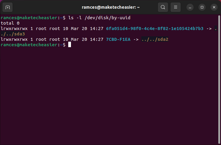 A terminal window showing the symbolic link between UUID and the SSD's partitions.