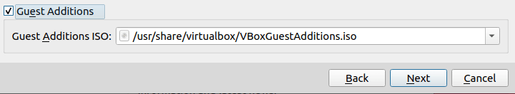 A screenshot showing the Guest Additions option in VirtualBox.