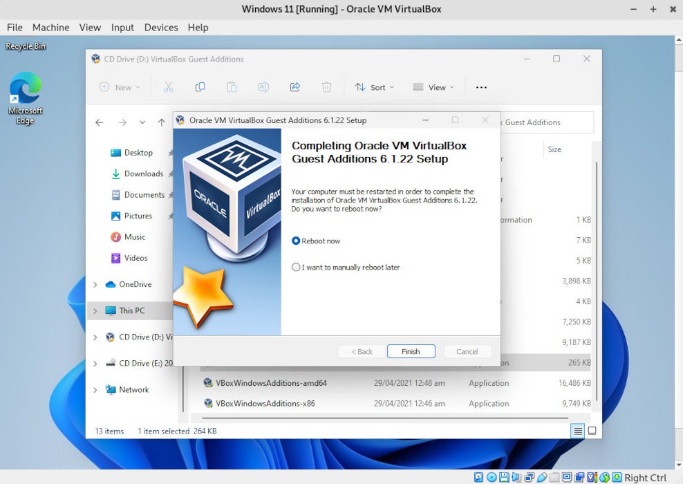 A screenshot showing the reboot confirmation in the Guest Additions installer.