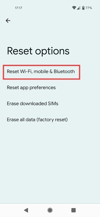 Tapping on "Reset Wi-Fi, mobile & Bluetooth" option on Android phone. 