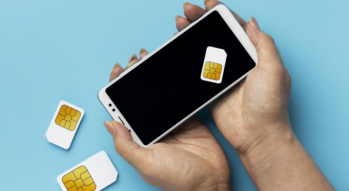 Multiple SIM cards view and smartphone.