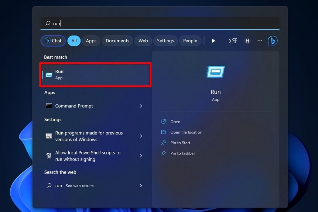Typing "Run" in Windows Search. 
