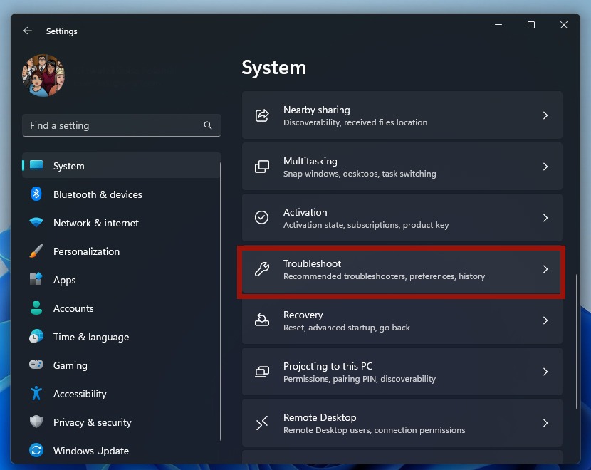 Clicking on "Troubleshoot" option via System in Settings. 