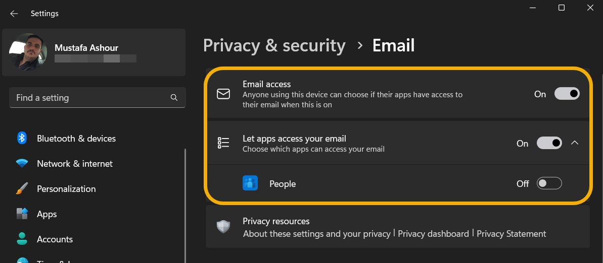 Granting email access to apps privacy settings via Windows Settings. 