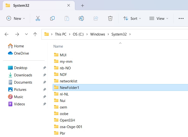 New folder created using PowerShell command visible in File Explorer System32.