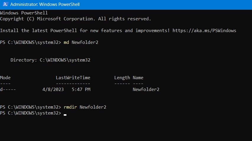 md and rmdir commands used in PowerShell window to create and remove empty folders. 